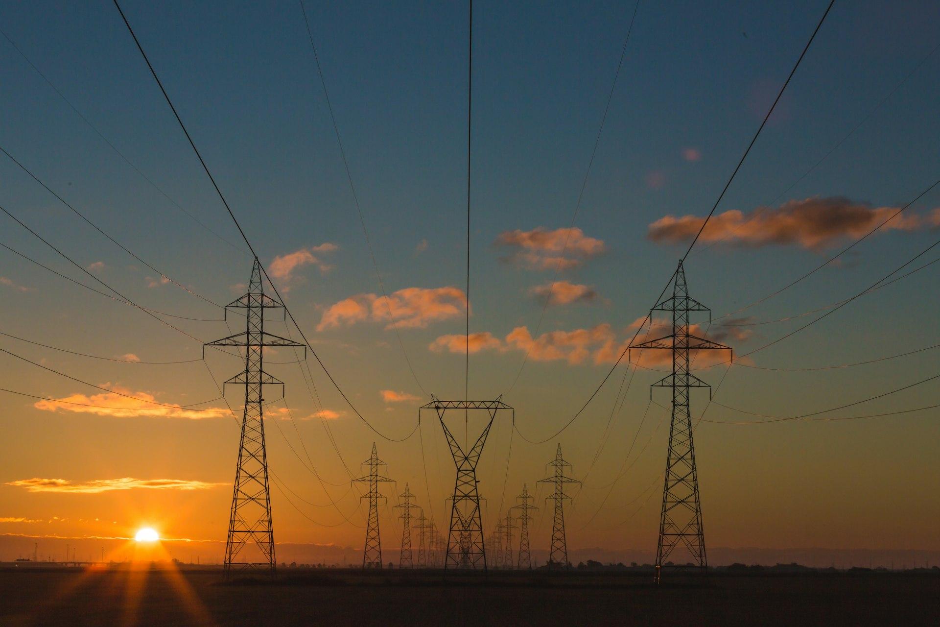 Power transmission lines at sunset